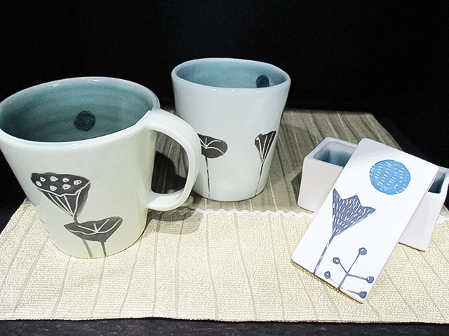 Blue Mug<br>A beautiful blue and white cup and a small box